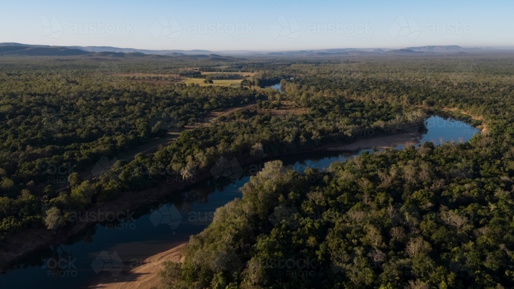 Aerial view of river surrounded by bushland - Australian Stock Image