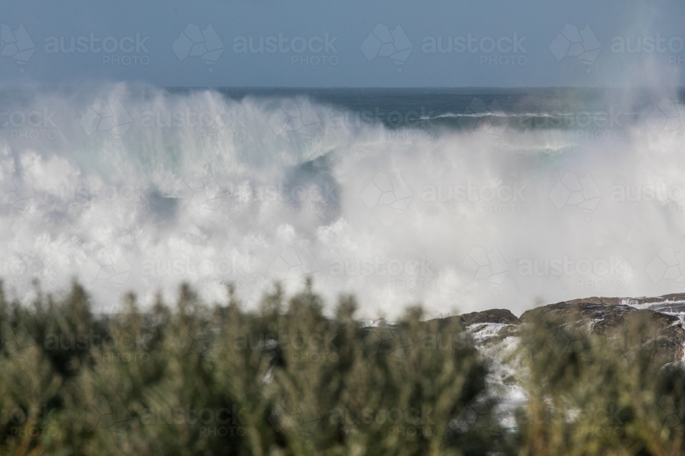 Horizontal shot of big waves in the ocean - Australian Stock Image