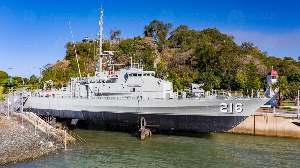 Horizontal shot of docked warship at East Shores Gladstone - Australian Stock Image