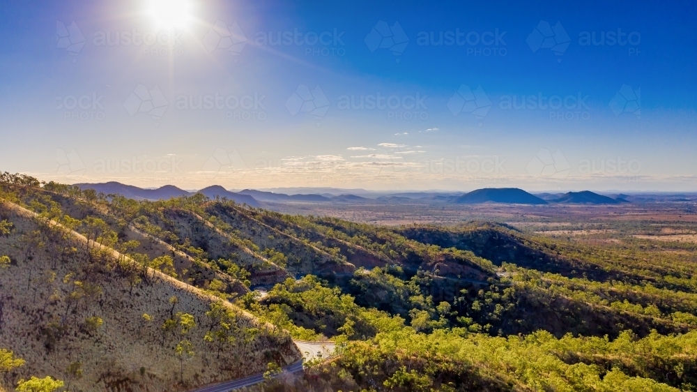 Horizontal shot of mountains, hills, and plateaus near Mount Morgan - Australian Stock Image