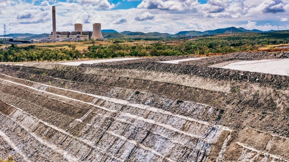 Horizontal shot of Stanwell power station and ash piles - Australian Stock Image