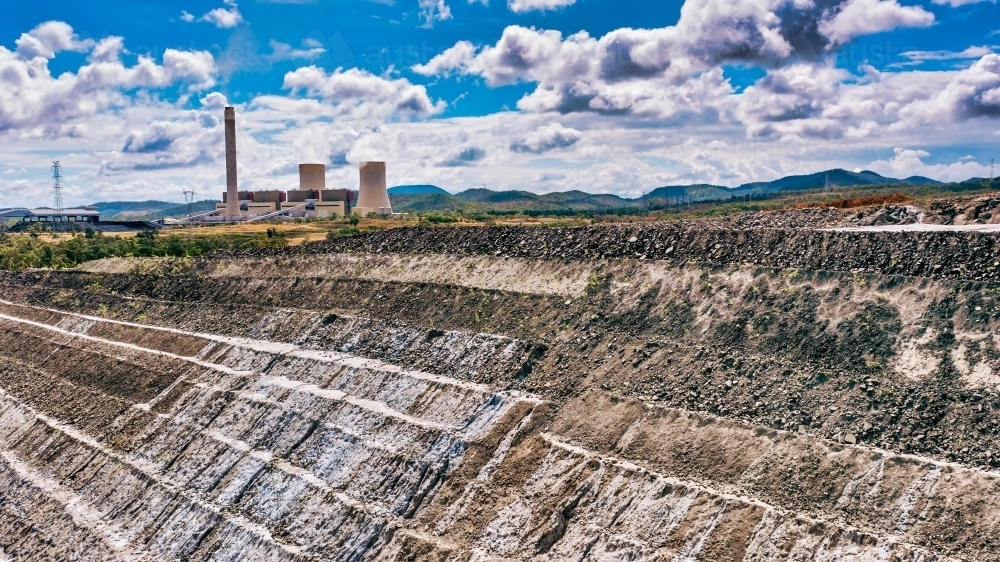 Horizontal shot of Stanwell power station and ash piles - Australian Stock Image