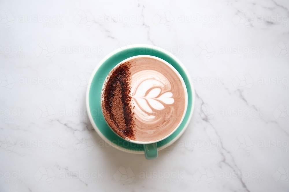 Hot chocolate in teal cup and saucer - Australian Stock Image