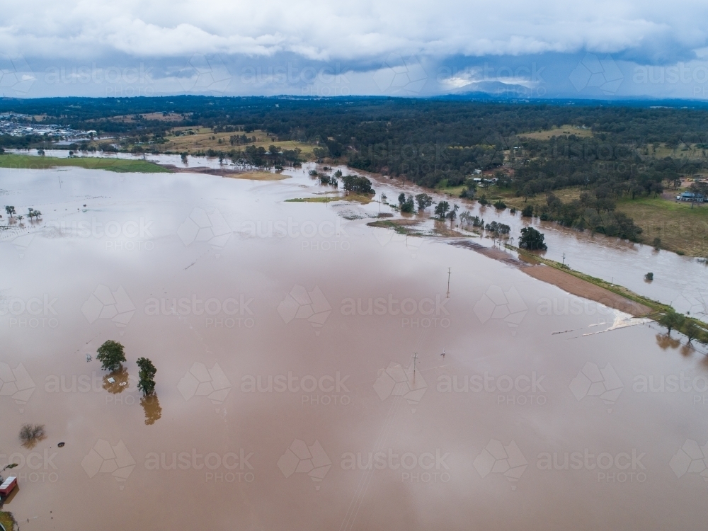 Hunter river during flood with floodwater covering farmland in Singleton - Australian Stock Image