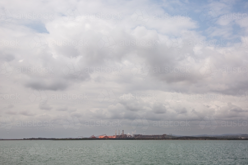 Industrial activity on the shores of Gladstone Harbour - Australian Stock Image