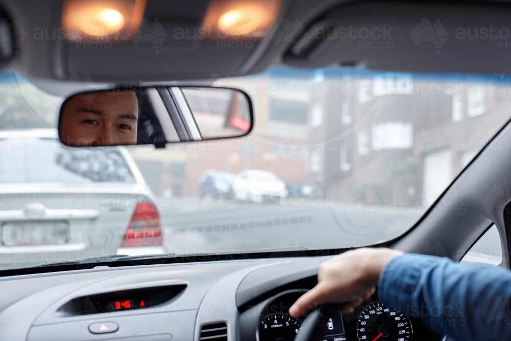 Interior of man driving car - Australian Stock Image