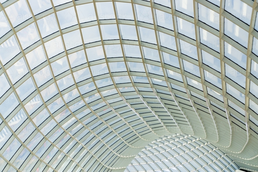 Interior view of a curved ceiling of glass windows - Australian Stock Image