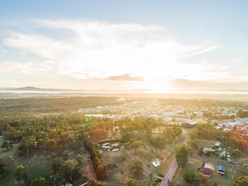 Intersection of bush and built environment, rural edge of town industrial area - Australian Stock Image