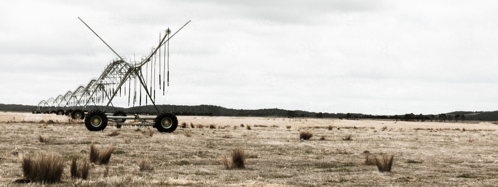 irrigation system sitting within the landscape - Australian Stock Image