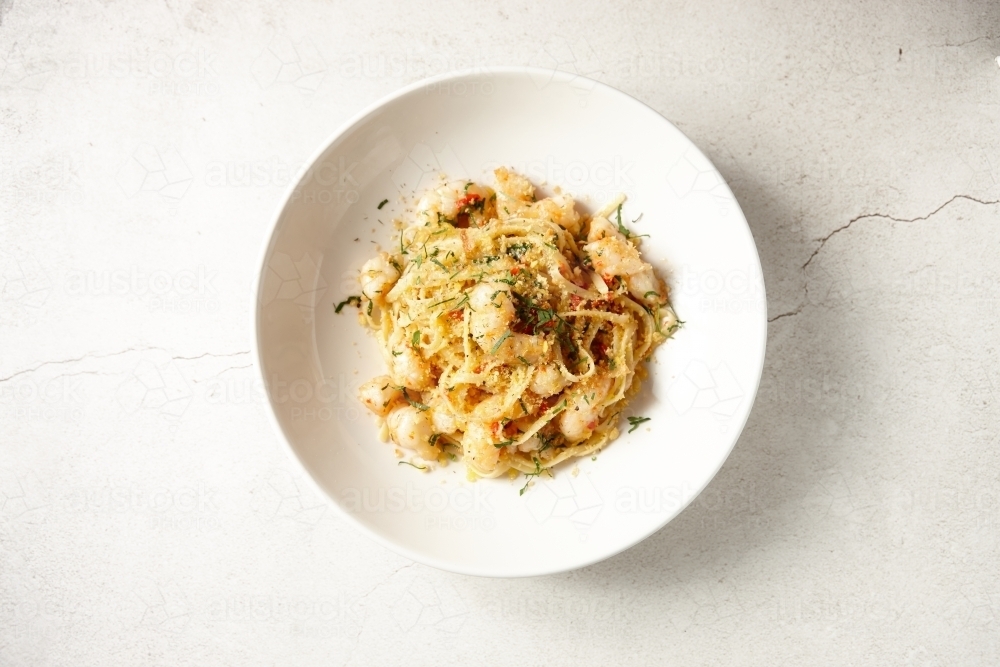 Italian gourmet prawn pasta in bowl - Australian Stock Image