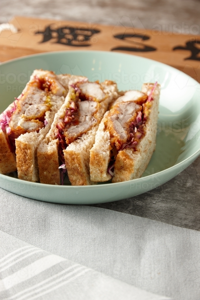 Japanese-style katsu chicken sandwich - Australian Stock Image