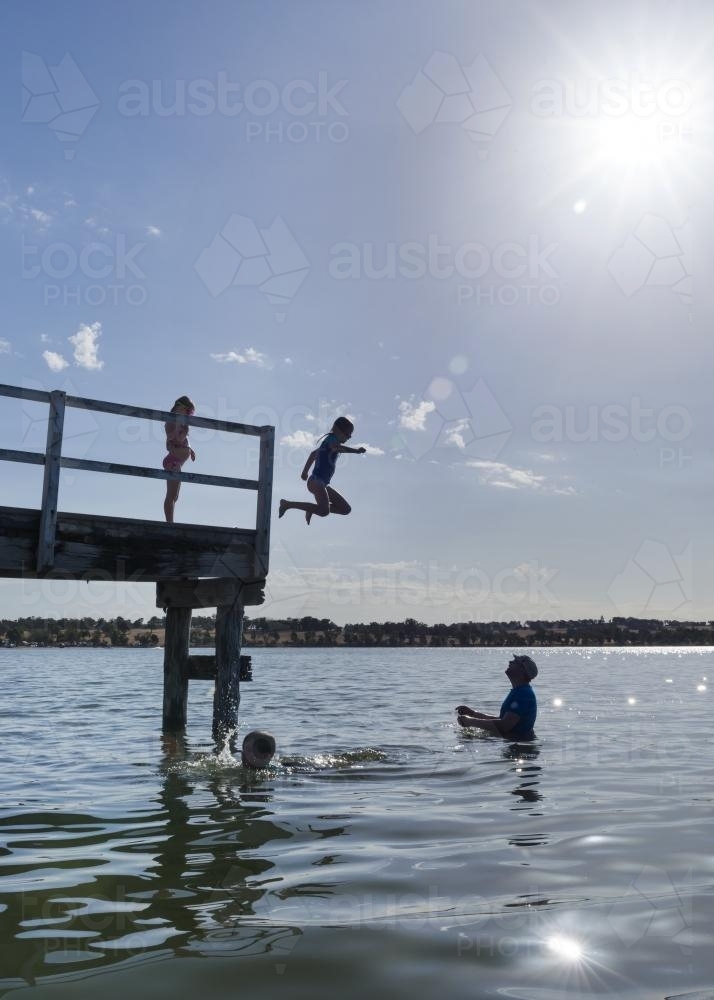 Jetty Jumping - Australian Stock Image