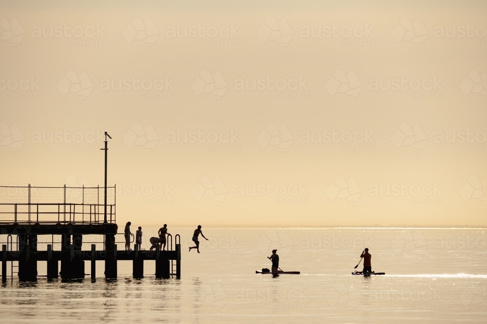 Jumping off pier - Australian Stock Image