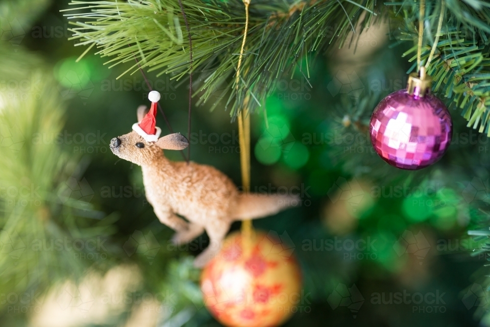 Kangaroo and santa hat decoration on a christmas tree - Australian Stock Image