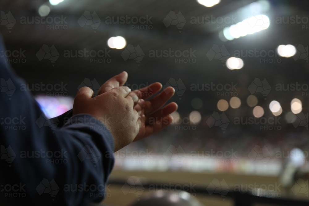 Kid's hands clapping - Australian Stock Image