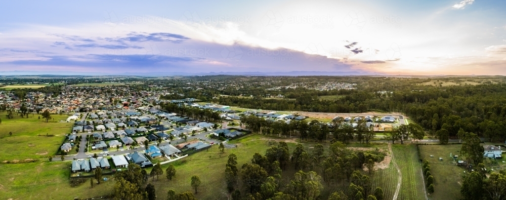 Land development - aerial view of edge of residential and undeveloped land - Australian Stock Image