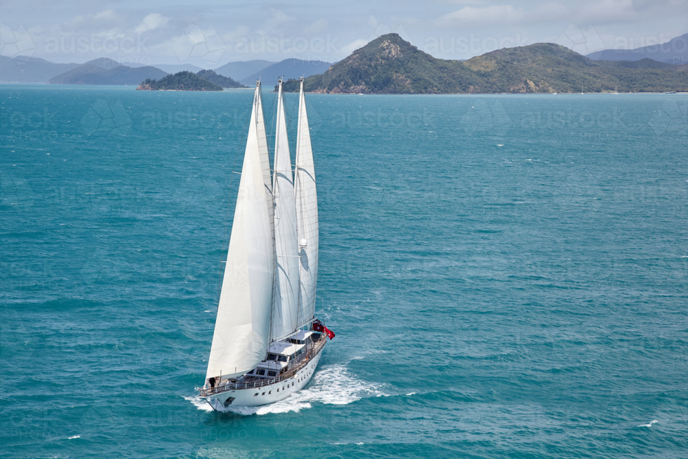 Large sailing yacht in the Whitsunday Islands - Australian Stock Image