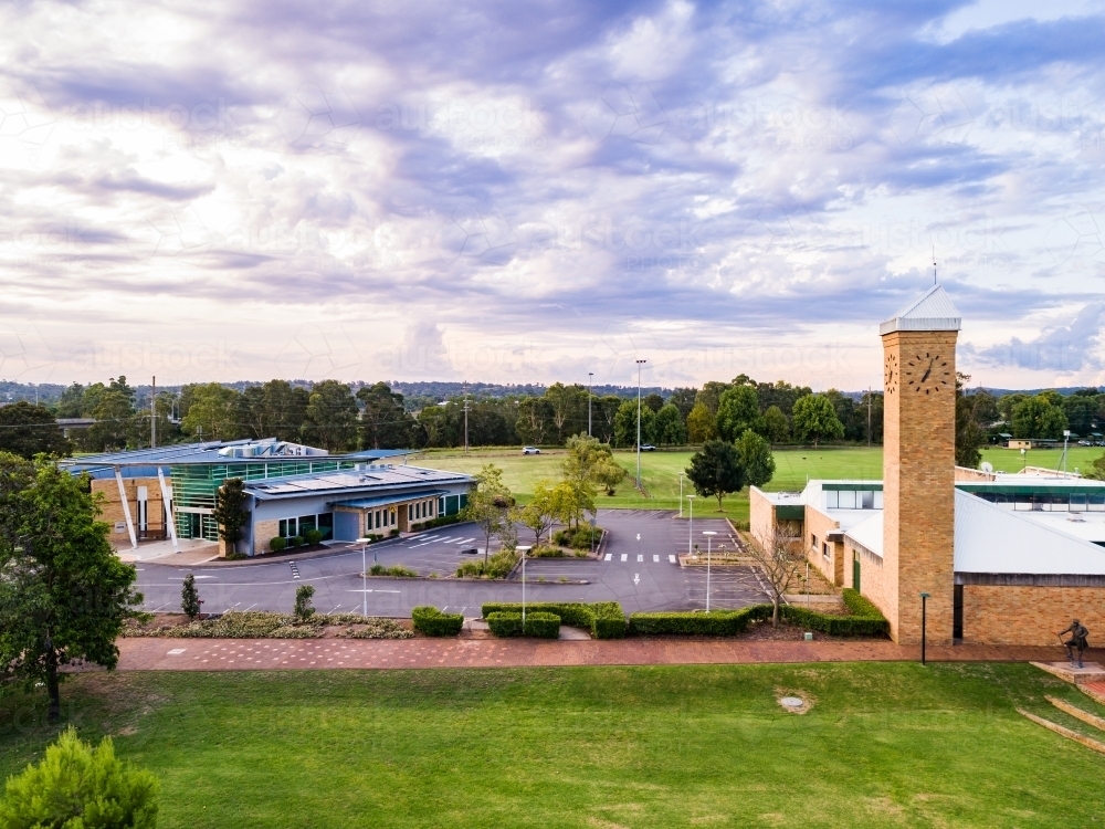 Library with empty carpark and footpath to clock tower - Australian Stock Image