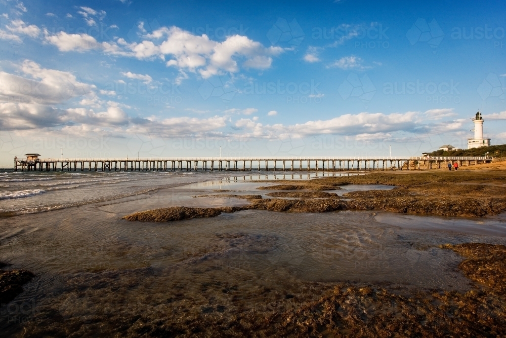 Lighthouse and long jetty with shed - Australian Stock Image