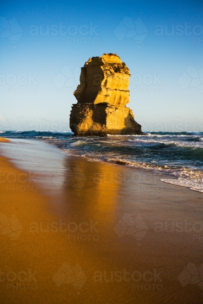 limestone stack reflected in the water - Australian Stock Image