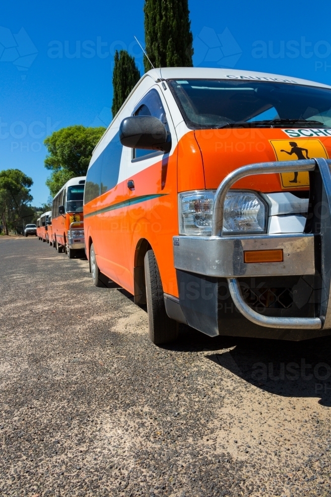 Line of orange school buses - Australian Stock Image