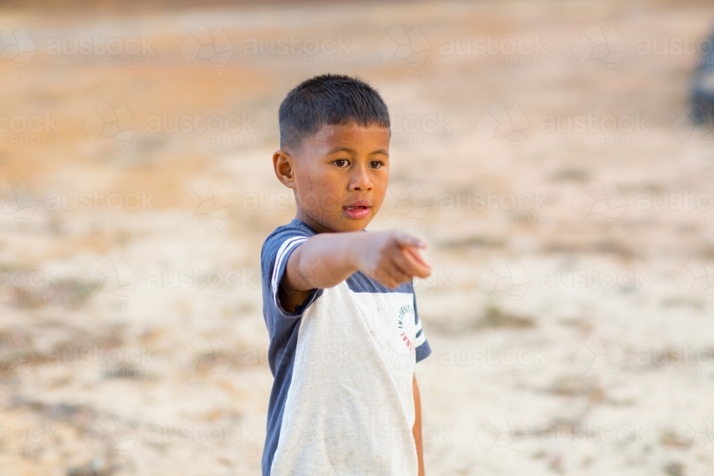 Little boy pointing - Australian Stock Image