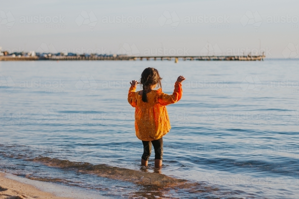 little girl in sea - Australian Stock Image