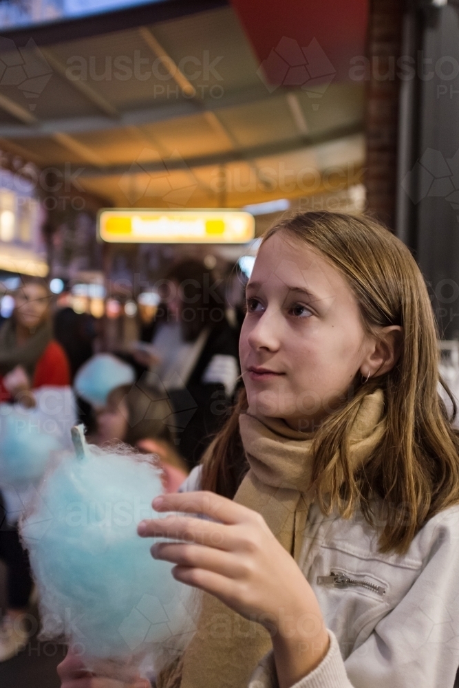 little girl with fairy floss - Australian Stock Image