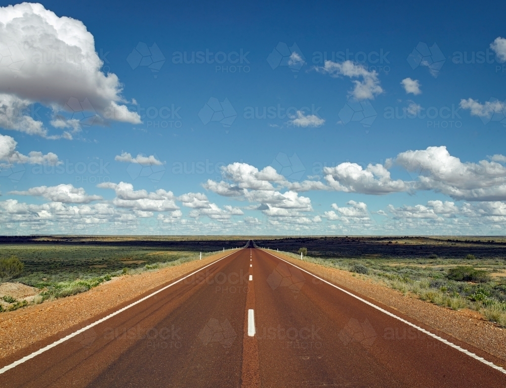 Long straight highway in outback - Australian Stock Image