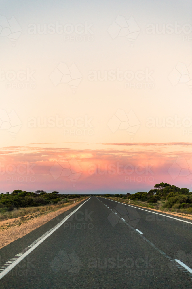 Long straight open road heading East on the Eyre Highway, Western Australia - Australian Stock Image