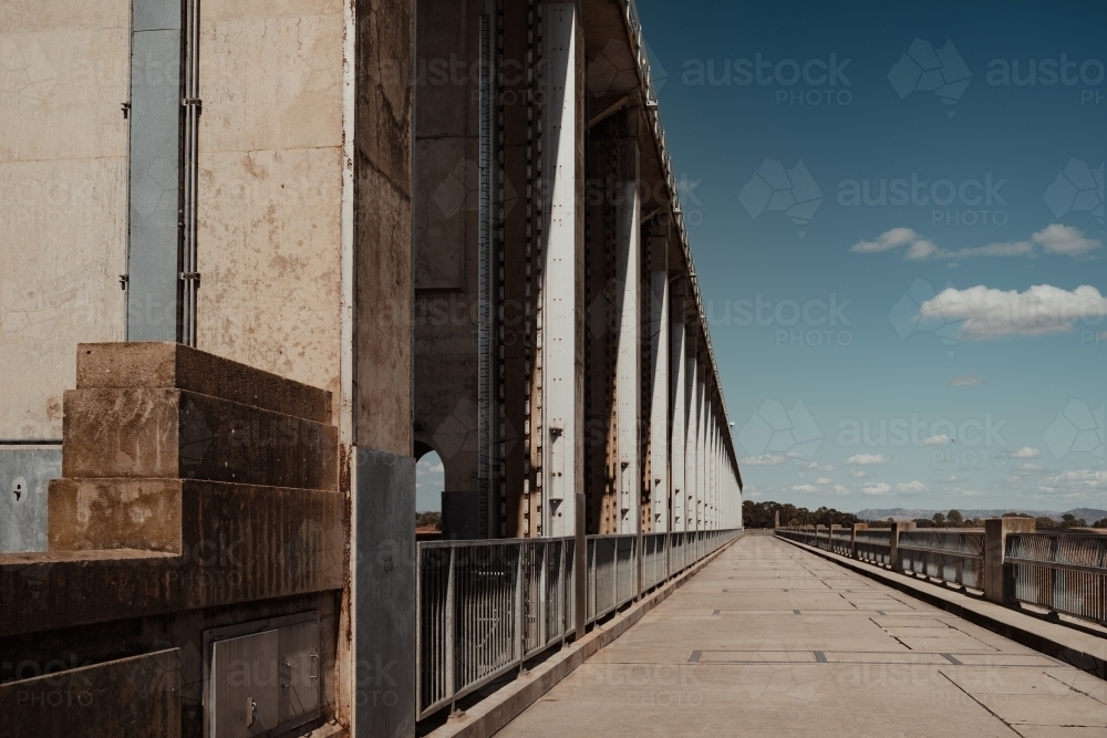 Looking along the Dam Wall at Hume Dam near Albury and Wodonga. - Australian Stock Image