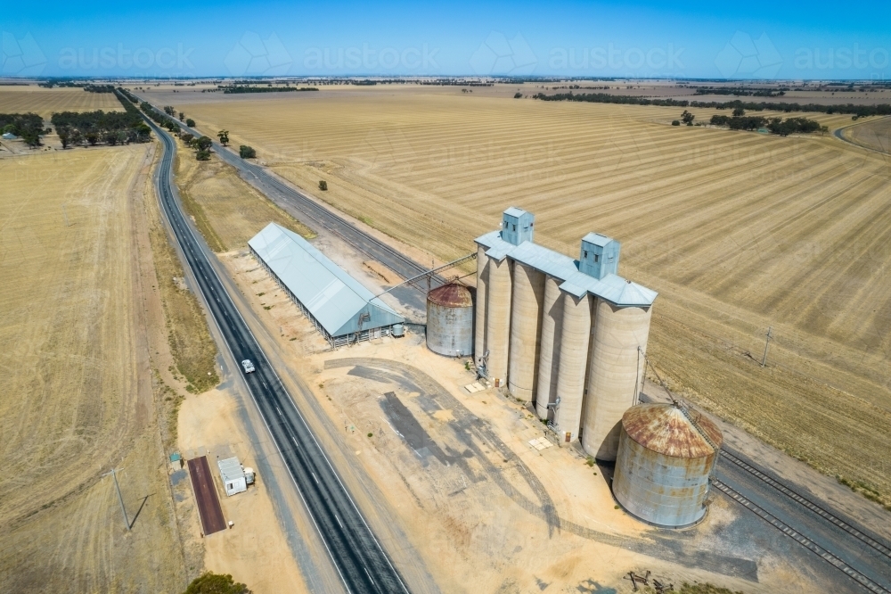 Looking down at silos, grain storage and railway line in the Mallee - Australian Stock Image