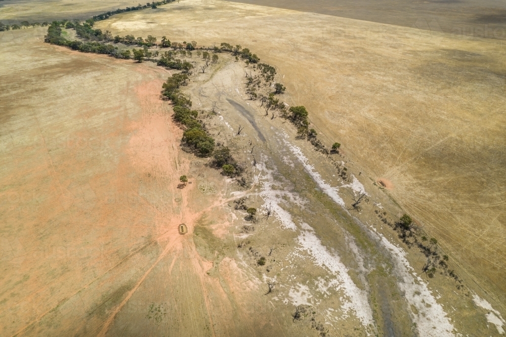 Looking down on a dried up creek bed during drought. - Australian Stock Image