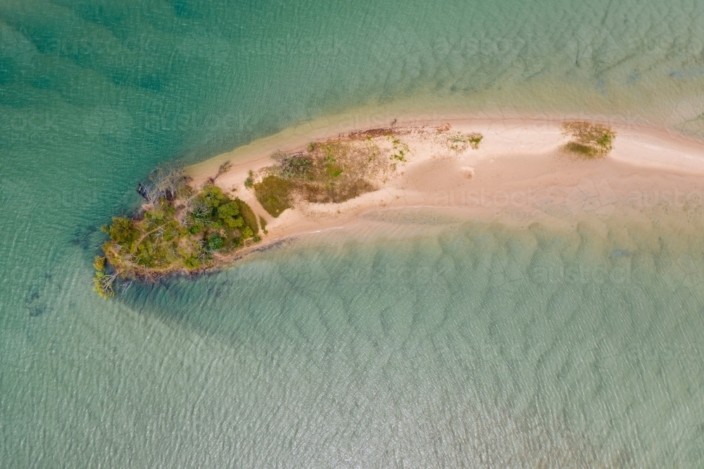 Looking down on a small sand island in a coastal river - Australian Stock Image