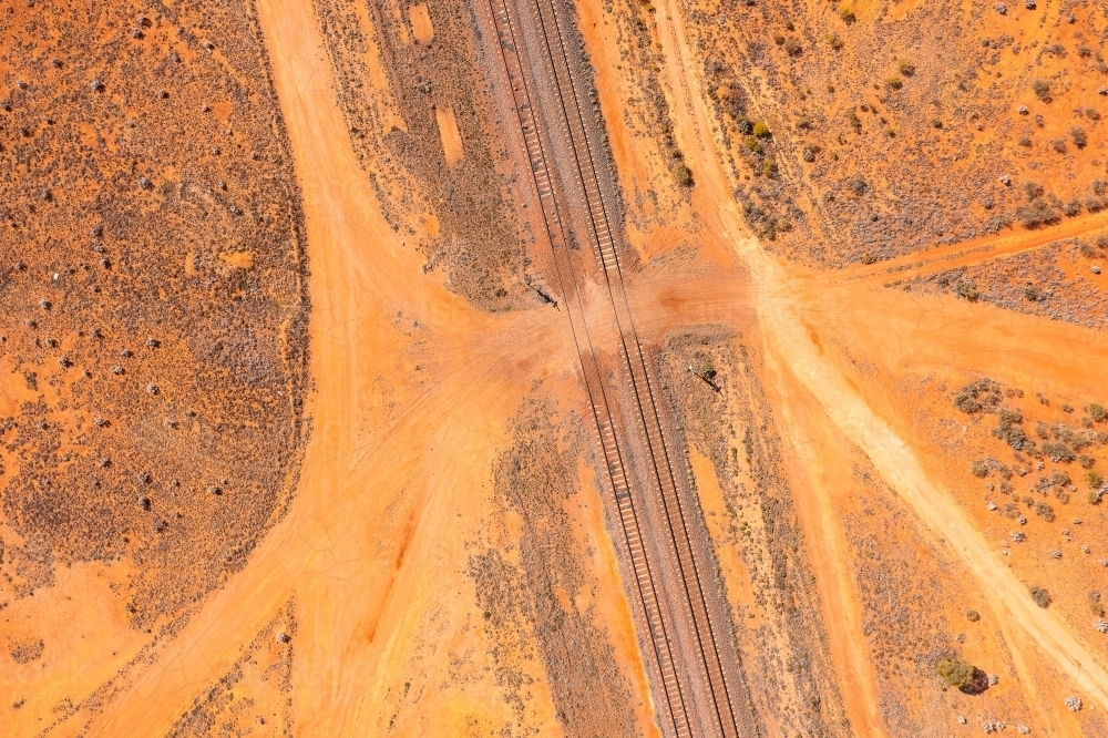 looking down on railway line crossing in central australia - Australian Stock Image