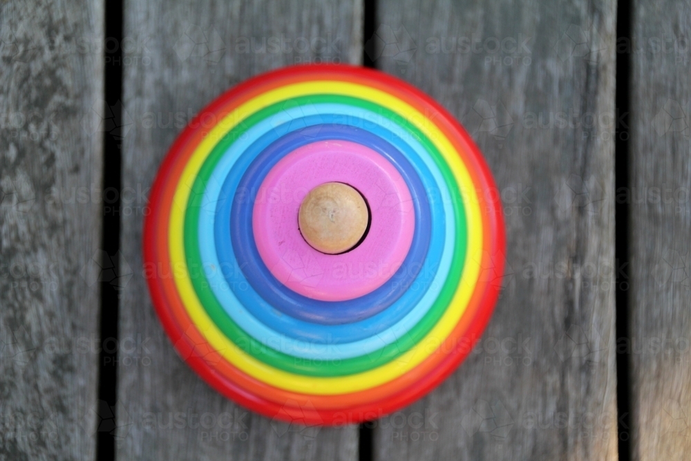 Looking down onto a stack of coloured rings - Australian Stock Image