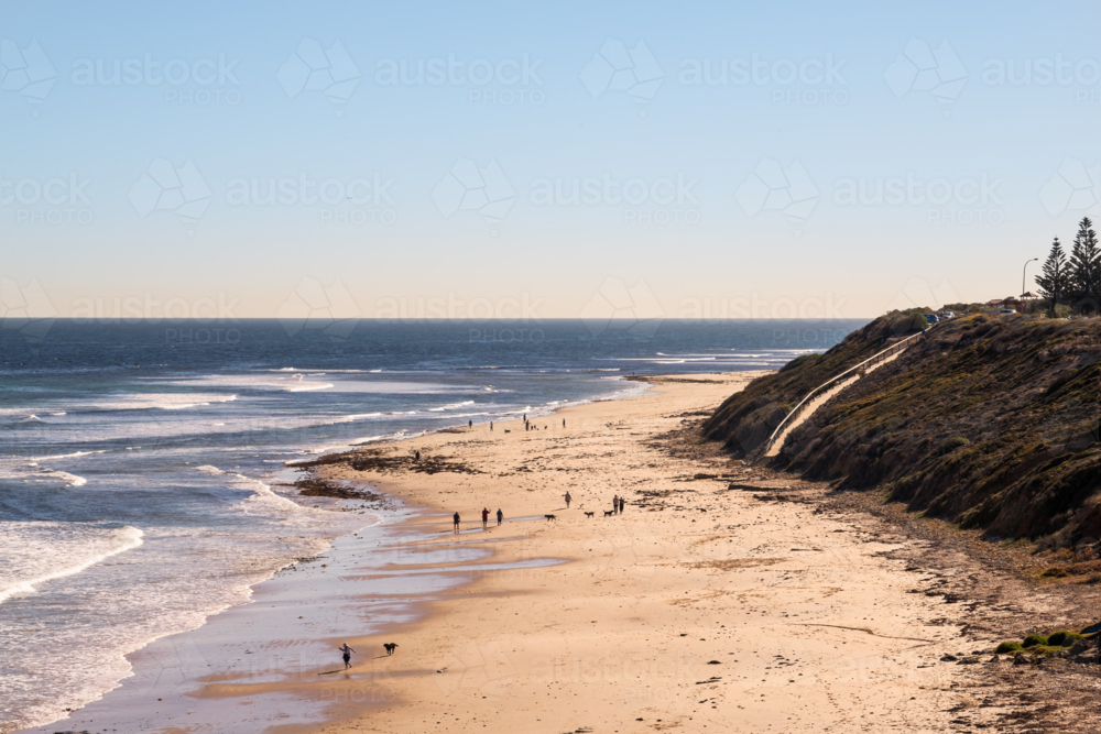 Looking down towards of people on beach, Seaford Beach, South Australia - Australian Stock Image