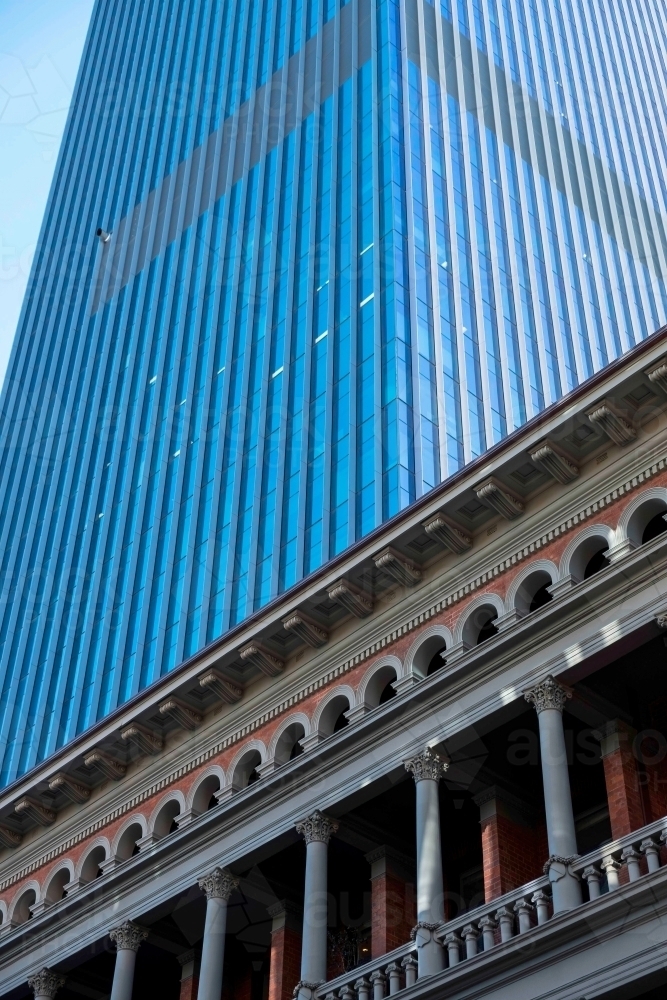 Looking up at buildings showing old against new - Australian Stock Image