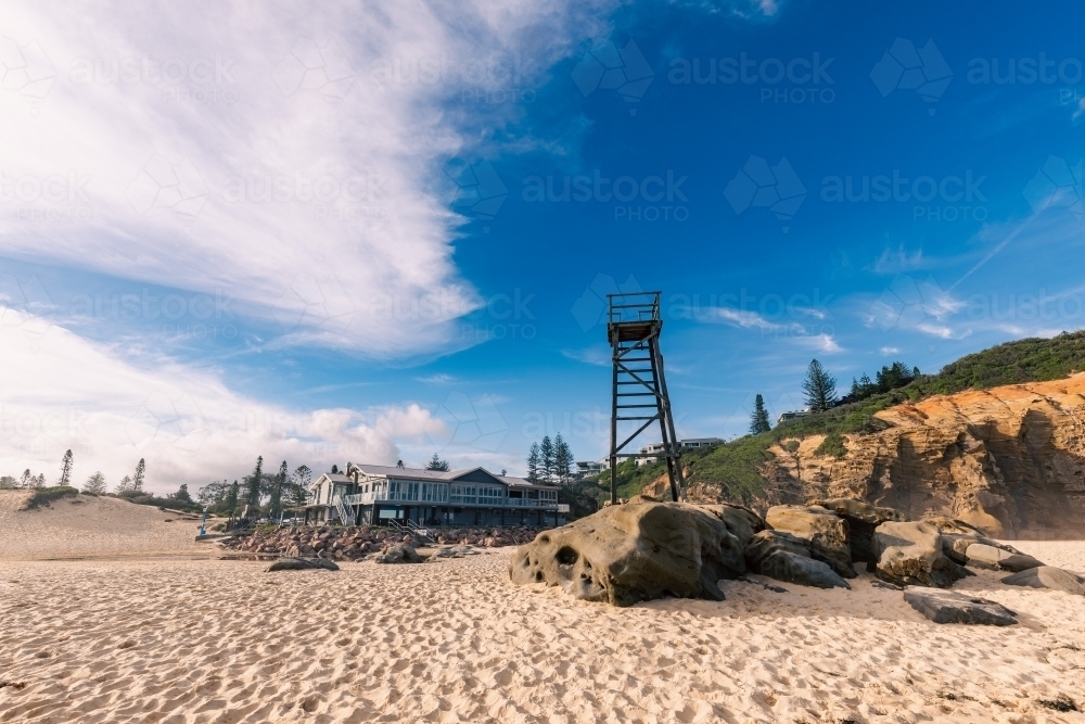 Lookout tower on Redhead Beach with Surf Club in background - Australian Stock Image