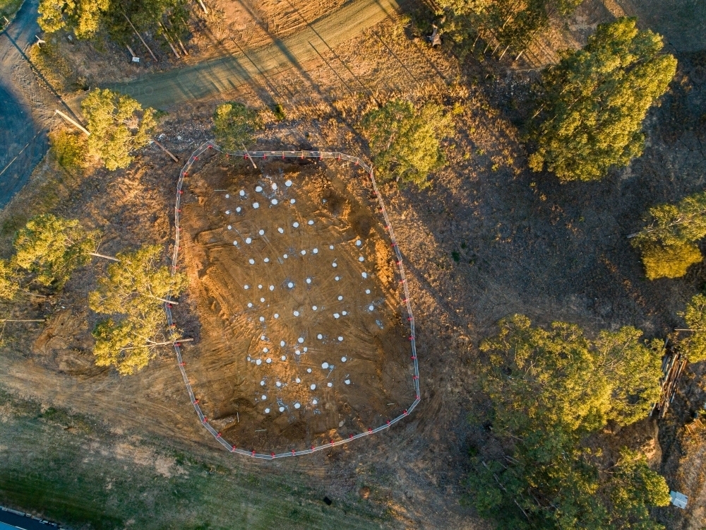 Lot with construction site for house build under way - Australian Stock Image