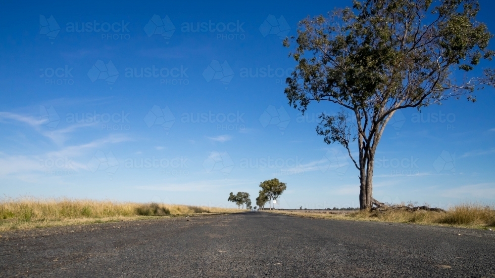 Low angle view of country road and sky - Australian Stock Image