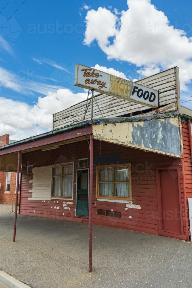 Low angled view of a disused take away food store in a rural town - Australian Stock Image