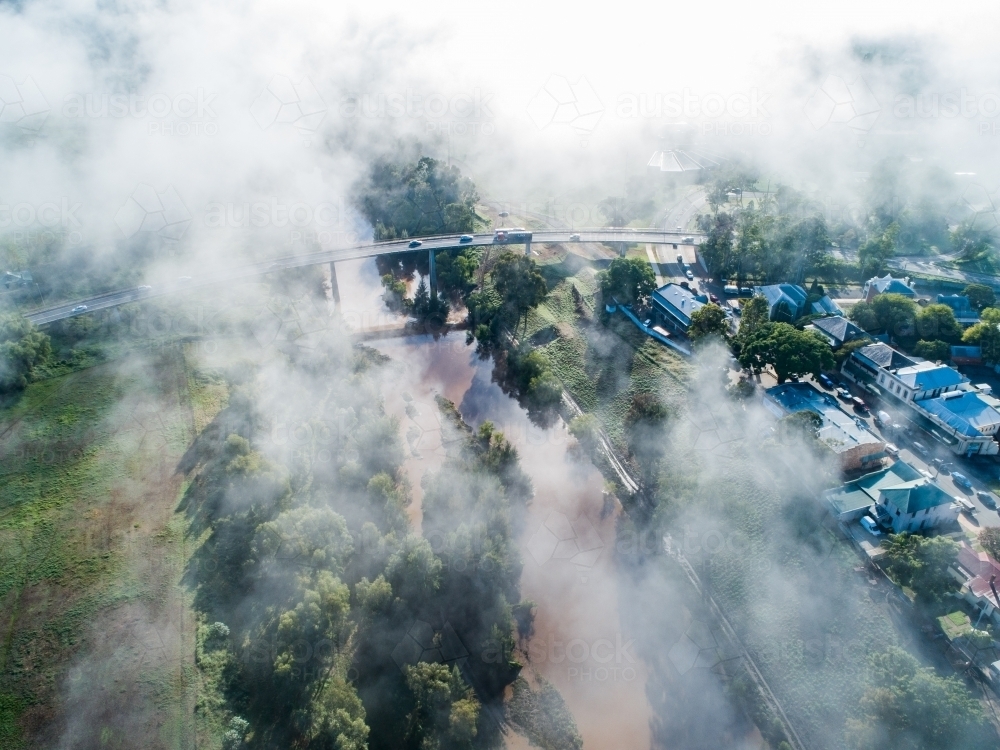 Low cloud and mist covering New England Highway bridge going over the Hunter River in Singleton - Australian Stock Image
