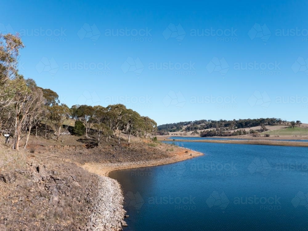 Low water level in a regional water supply dam - Australian Stock Image