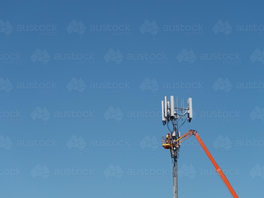 Maintenance on a mobile phone tower - Australian Stock Image