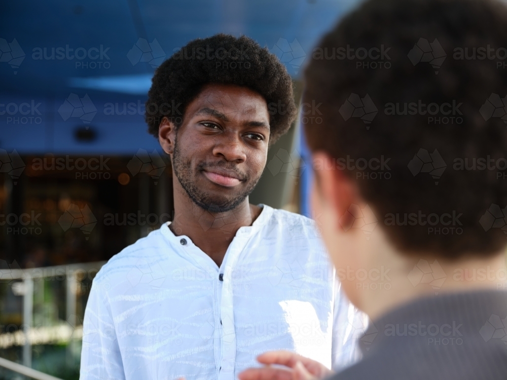 Man having a conversation outside - Australian Stock Image