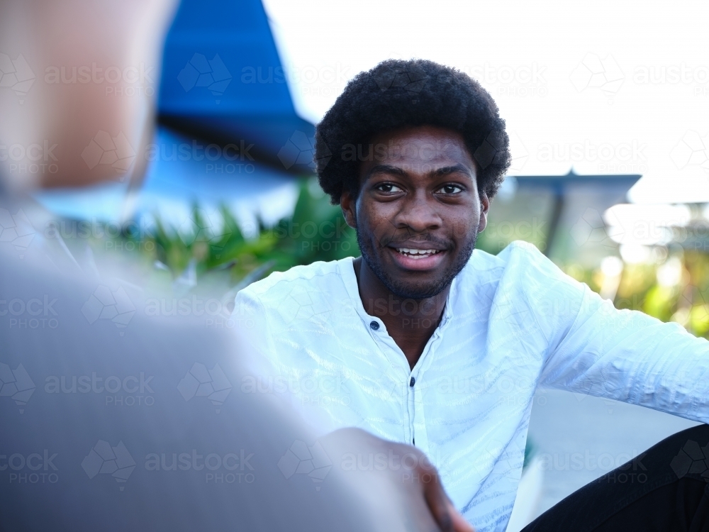 Man having a conversation outside - Australian Stock Image