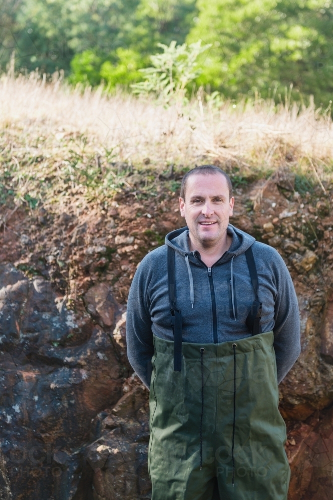 man in fishing waders - Australian Stock Image