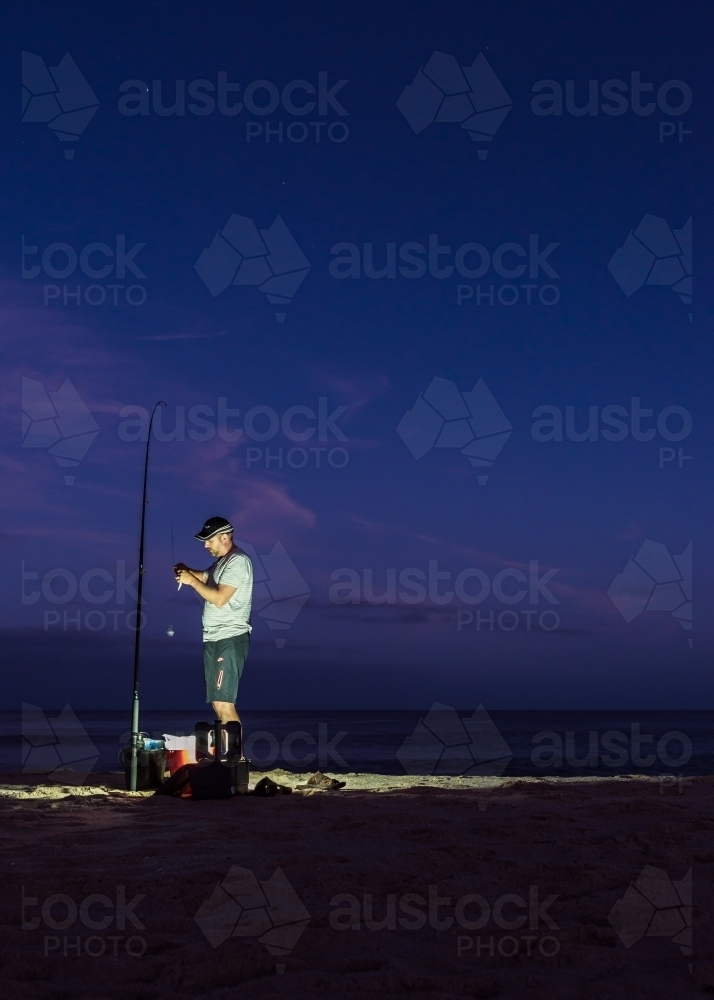 Man Preparing For Pre Dawn Fishing - Australian Stock Image