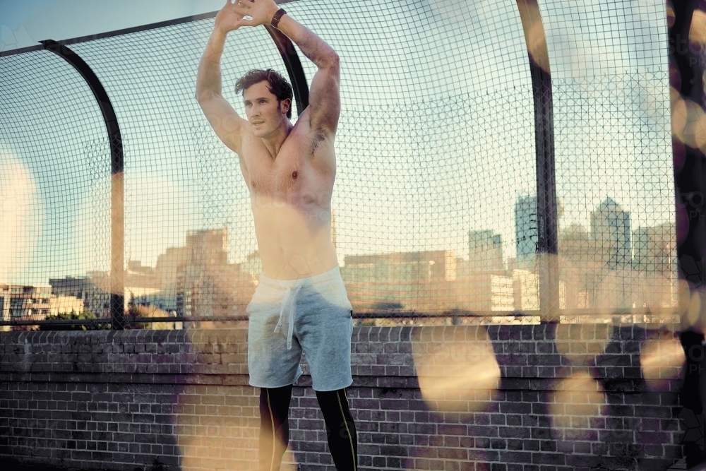 Man stretching fitness - Australian Stock Image